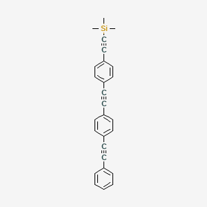 B1315348 Trimethyl((4-((4-(phenylethynyl)phenyl)ethynyl)phenyl)ethynyl)silane CAS No. 518342-75-1
