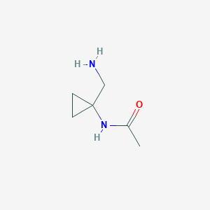 molecular formula C6H12N2O B13158168 N-[1-(aminomethyl)cyclopropyl]acetamide 