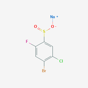 molecular formula C6H2BrClFNaO2S B13159112 Sodium 4-bromo-5-chloro-2-fluorobenzene-1-sulfinate 