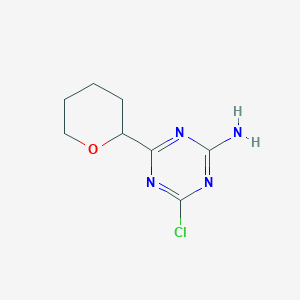 molecular formula C8H11ClN4O B13159191 4-Chloro-6-(oxan-2-YL)-1,3,5-triazin-2-amine 