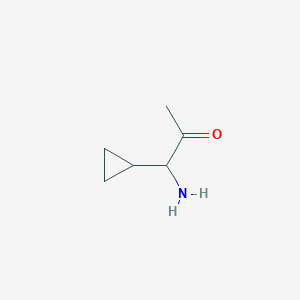 molecular formula C6H11NO B13159352 1-Amino-1-cyclopropylacetone 