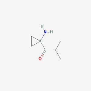 molecular formula C7H13NO B13159603 1-(1-Aminocyclopropyl)-2-methylpropan-1-one 