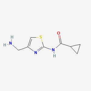 molecular formula C8H11N3OS B13160639 N-[4-(Aminomethyl)-1,3-thiazol-2-yl]cyclopropanecarboxamide 