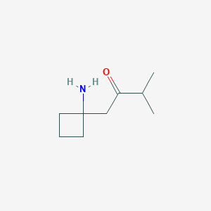 molecular formula C9H17NO B13164589 1-(1-Aminocyclobutyl)-3-methylbutan-2-one 