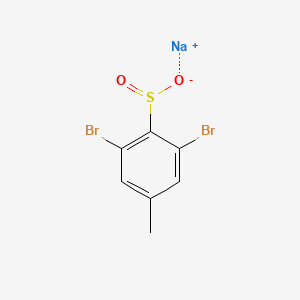 molecular formula C7H5Br2NaO2S B13167722 Sodium 2,6-dibromo-4-methylbenzene-1-sulfinate 