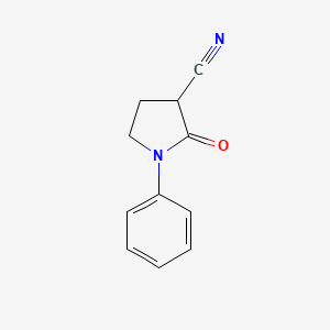 B1317289 2-Oxo-1-phenylpyrrolidine-3-carbonitrile CAS No. 930298-96-7