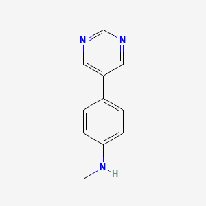 molecular formula C11H11N3 B13172921 N-Methyl-4-(pyrimidin-5-yl)aniline 