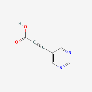 3-(Pyrimidin-5-yl)prop-2-ynoic acid