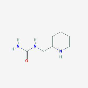 [(Piperidin-2-yl)methyl]urea