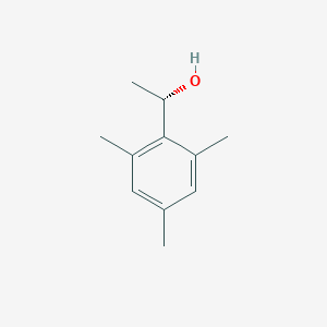 molecular formula C11H16O B13183597 (1S)-1-(2,4,6-trimethylphenyl)ethan-1-ol 