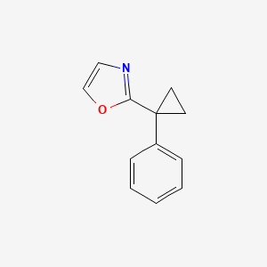 molecular formula C12H11NO B13185140 2-(1-Phenylcyclopropyl)-1,3-oxazole 