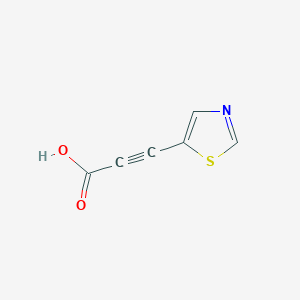 molecular formula C6H3NO2S B13185335 3-(1,3-Thiazol-5-yl)prop-2-ynoic acid 