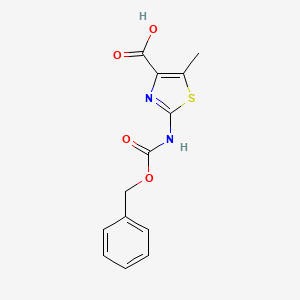 molecular formula C13H12N2O4S B13186629 Cbz-2-amino-5-methylthiazole-4-carboxylicacid 