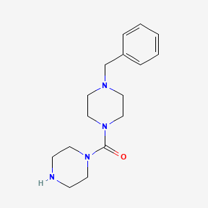 molecular formula C16H24N4O B13187270 1-Benzyl-4-(piperazine-1-carbonyl)piperazine 