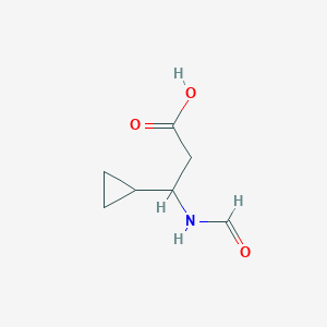 molecular formula C7H11NO3 B13189455 3-Cyclopropyl-3-formamidopropanoic acid 