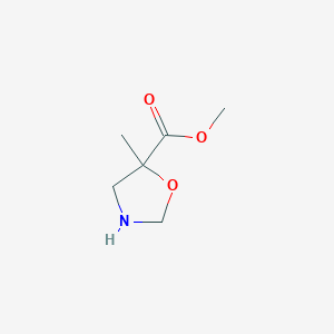 molecular formula C6H11NO3 B13193572 Methyl 5-methyl-1,3-oxazolidine-5-carboxylate 