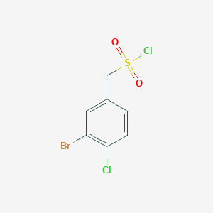 molecular formula C7H5BrCl2O2S B13194634 (3-Bromo-4-chlorophenyl)methanesulfonyl chloride 