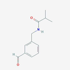 molecular formula C12H15NO2 B13194810 N-[(3-Formylphenyl)methyl]-2-methylpropanamide 