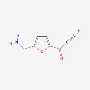 molecular formula C8H7NO2 B13195869 1-[5-(Aminomethyl)furan-2-yl]prop-2-yn-1-one 