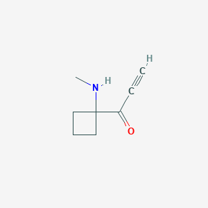 molecular formula C8H11NO B13196287 1-[1-(Methylamino)cyclobutyl]prop-2-yn-1-one 