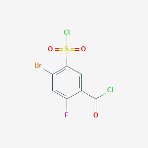 molecular formula C7H2BrCl2FO3S B13197044 4-Bromo-5-(chlorosulfonyl)-2-fluorobenzoyl chloride 