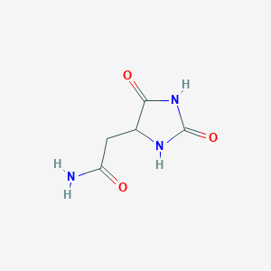 molecular formula C5H7N3O3 B1319997 (2,5-Dioxoimidazolidin-4-yl)acetamide 