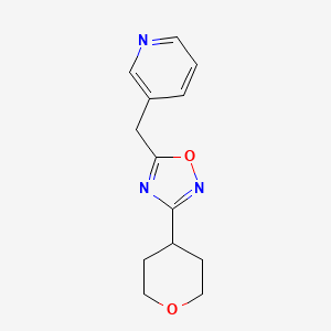 3-{[3-(Oxan-4-yl)-1,2,4-oxadiazol-5-yl]methyl}pyridine