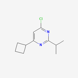 molecular formula C11H15ClN2 B13200301 4-Chloro-6-cyclobutyl-2-(propan-2-YL)pyrimidine 