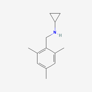 N-[(2,4,6-trimethylphenyl)methyl]cyclopropanamine