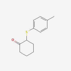 molecular formula C13H16OS B13200975 2-[(4-Methylphenyl)sulfanyl]cyclohexan-1-one 