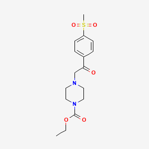 B1320586 Ethyl 4-{2-[4-(methylsulfonyl)phenyl]-2-oxoethyl}tetrahydro-1(2H)-pyrazinecarboxylate CAS No. 924869-22-7