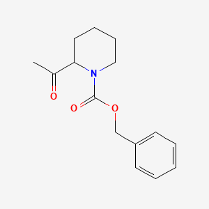 molecular formula C15H19NO3 B13210297 1-N-Cbz-2-acetylpiperidine 