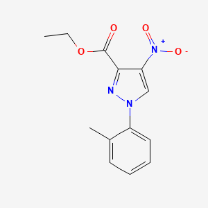 molecular formula C13H13N3O4 B13210740 Ethyl 1-(2-methylphenyl)-4-nitro-1H-pyrazole-3-carboxylate 