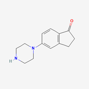 molecular formula C13H16N2O B1321084 5-(哌嗪-1-基)-2,3-二氢-1H-茚-1-酮 CAS No. 868245-03-8