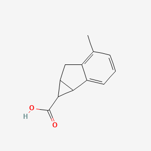 molecular formula C12H12O2 B13214999 5-Methyl-1H,1aH,6H,6aH-cyclopropa[a]indene-1-carboxylic acid 