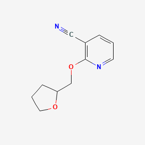 2-(Oxolan-2-ylmethoxy)pyridine-3-carbonitrile