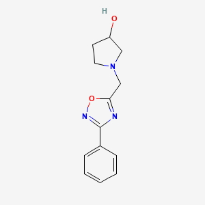 molecular formula C13H15N3O2 B13218022 1-[(3-Phenyl-1,2,4-oxadiazol-5-yl)methyl]pyrrolidin-3-ol 