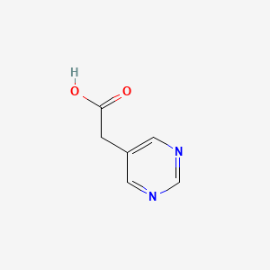 B1321828 5-Pyrimidineacetic acid CAS No. 5267-07-2