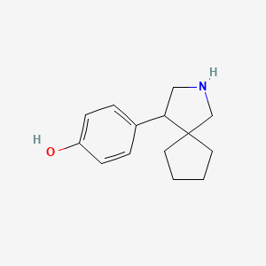 molecular formula C14H19NO B13219089 4-{2-Azaspiro[4.4]nonan-4-yl}phenol 