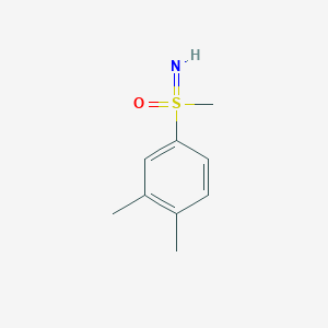 molecular formula C9H13NOS B13219217 1,2-Dimethyl-4-(S-methylsulfonimidoyl)benzene 