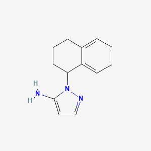 molecular formula C13H15N3 B13219255 1-(1,2,3,4-Tetrahydronaphthalen-1-yl)-1H-pyrazol-5-amine 