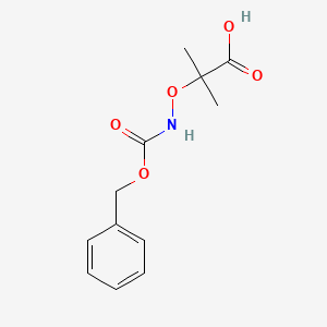 2-({[(Benzyloxy)carbonyl]amino}oxy)-2-methylpropanoic acid