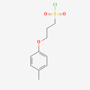 molecular formula C10H13ClO3S B13222801 3-(4-Methylphenoxy)propane-1-sulfonyl chloride 