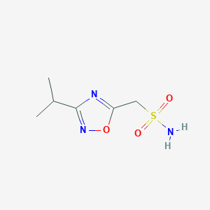 molecular formula C6H11N3O3S B13223401 [3-(Propan-2-yl)-1,2,4-oxadiazol-5-yl]methanesulfonamide 