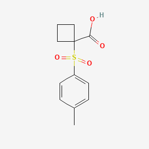 1-(4-Methylbenzenesulfonyl)cyclobutane-1-carboxylic acid