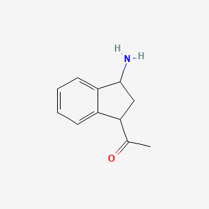 molecular formula C11H13NO B13225040 1-(3-Amino-2,3-dihydro-1H-inden-1-yl)ethan-1-one 