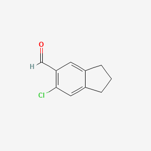 molecular formula C10H9ClO B13226975 6-Chloro-2,3-dihydro-1H-indene-5-carbaldehyde 