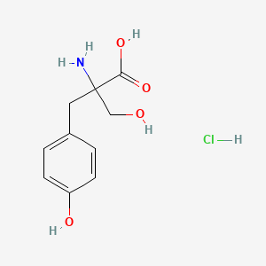 molecular formula C10H14ClNO4 B13232496 2-Amino-3-hydroxy-2-[(4-hydroxyphenyl)methyl]propanoic acid hydrochloride CAS No. 1955507-44-4