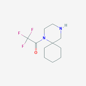 molecular formula C11H17F3N2O B13232537 1-{1,4-Diazaspiro[5.5]undecan-1-yl}-2,2,2-trifluoroethan-1-one 