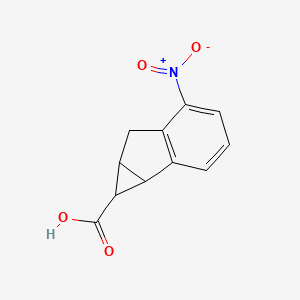 5-Nitro-1H,1aH,6H,6aH-cyclopropa[a]indene-1-carboxylic acid